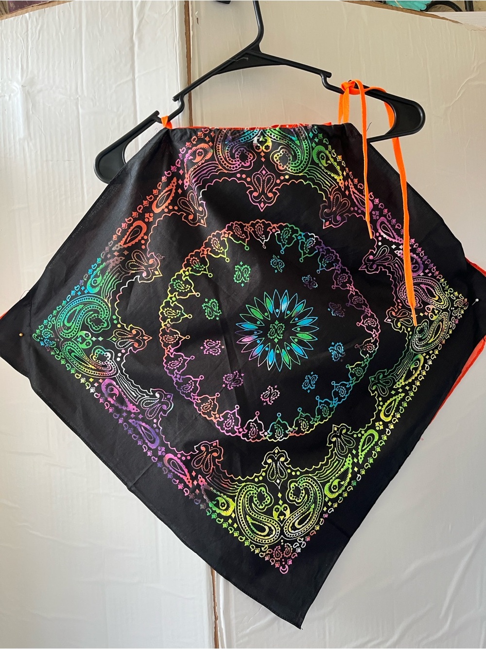Black and green top with orange color color on opposite side & Paisley Print
